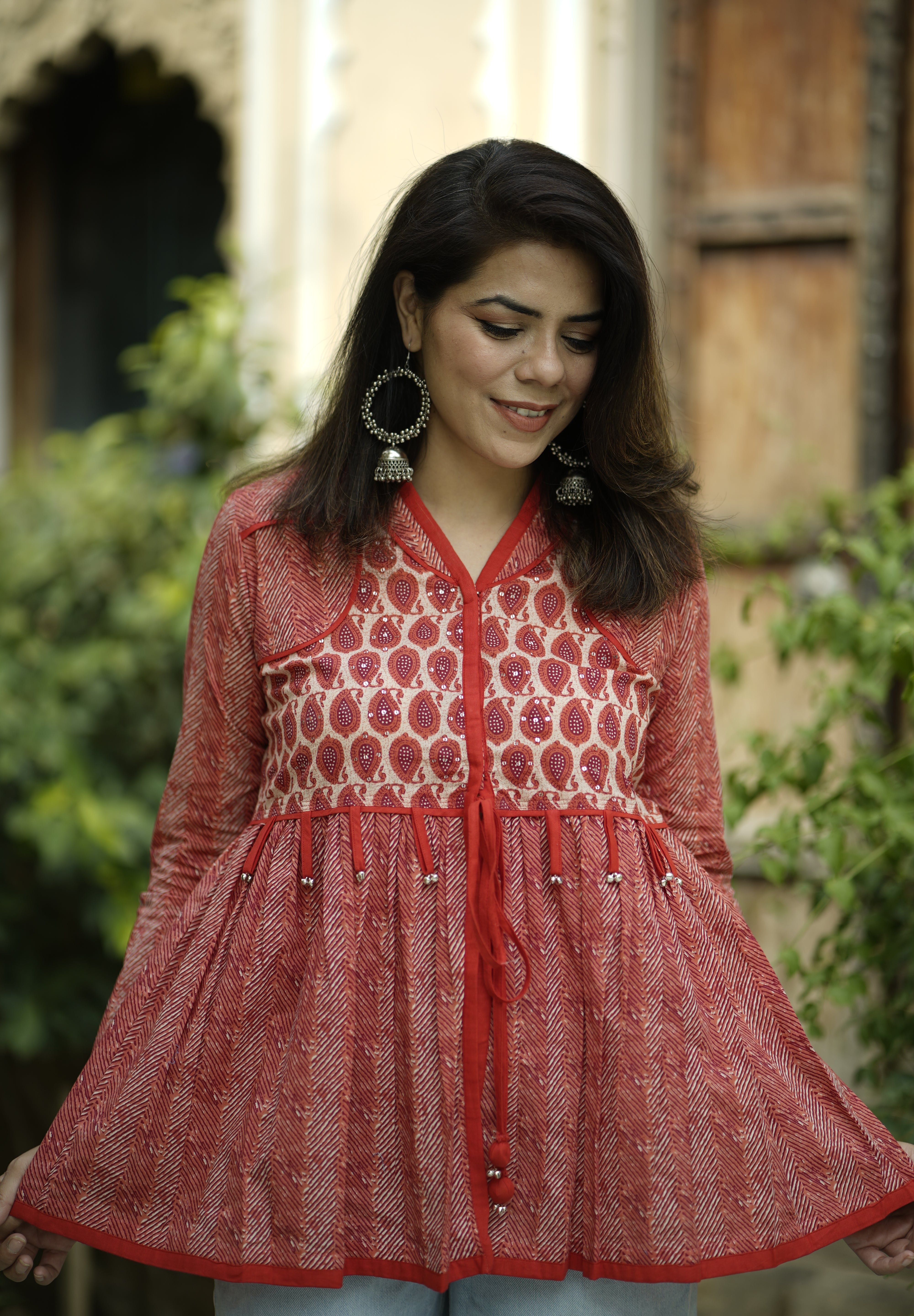 Red Printed Long Sleeves Peplum Top