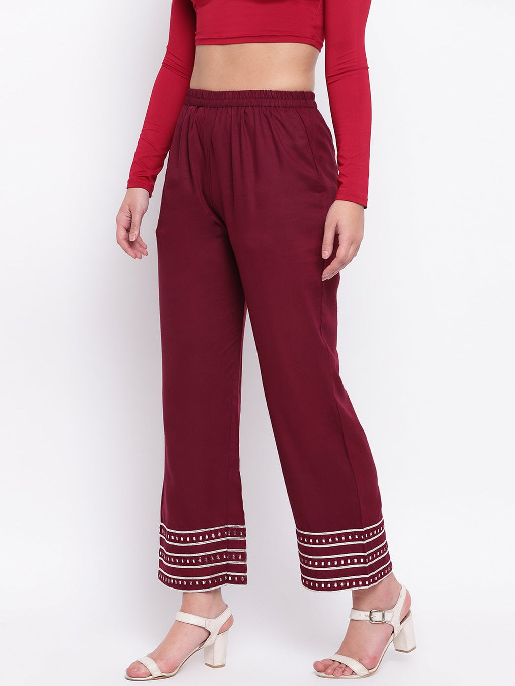 Buy Online Plus Size Women Maroon Solid Flared Palazzos at best price   Plussin